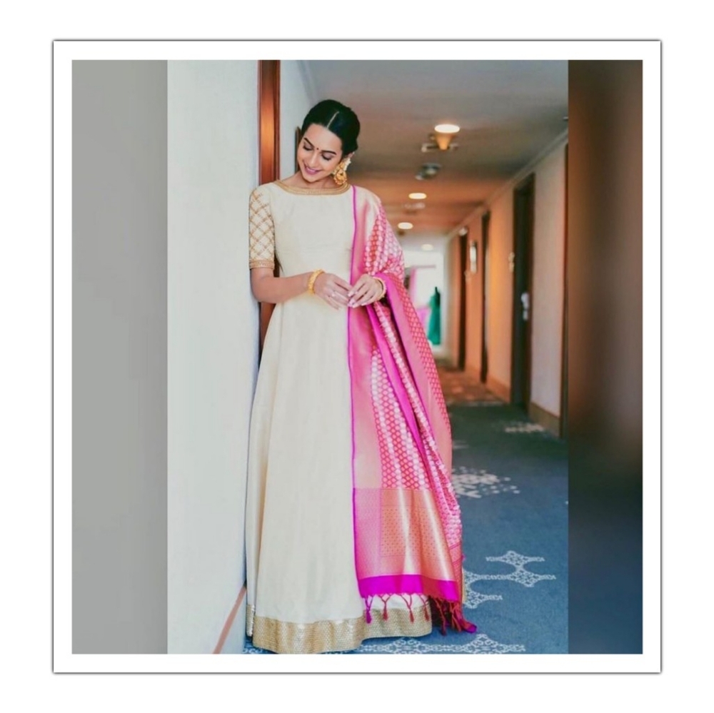 South Indian long dress with a pink silk dupatta